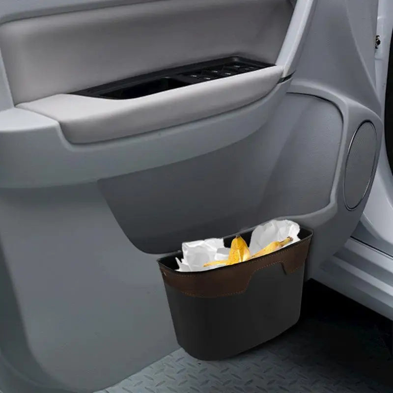 Compact Leak-Proof Car Trash Bin and Organizer for Vehicles  

Keep your vehicle spotless and organized with this versatile Car Trash Bin. Engineered from robust ABS plastic, it features a leak-proof design that ensures a tidy interior. Measuring 7.28 x