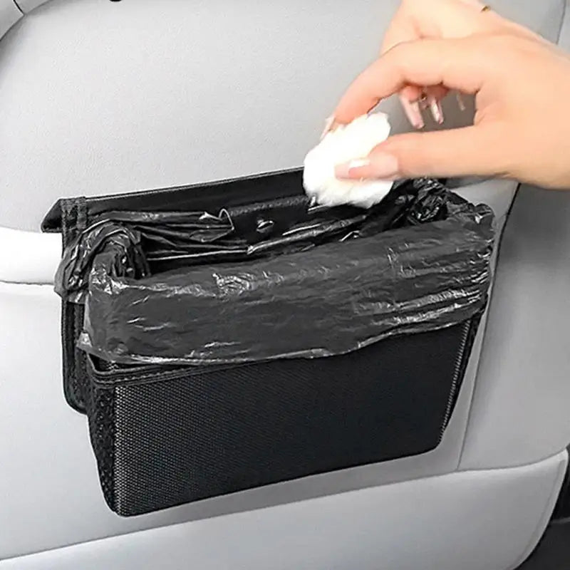 Compact Foldable Car Trash Bin with Magnetic Lid - Waterproof Backseat Organizer  

Transform your car's cleanliness with this innovative and versatile trash can. Its clever foldable design maximizes space and allows for easy storage when not in use. The