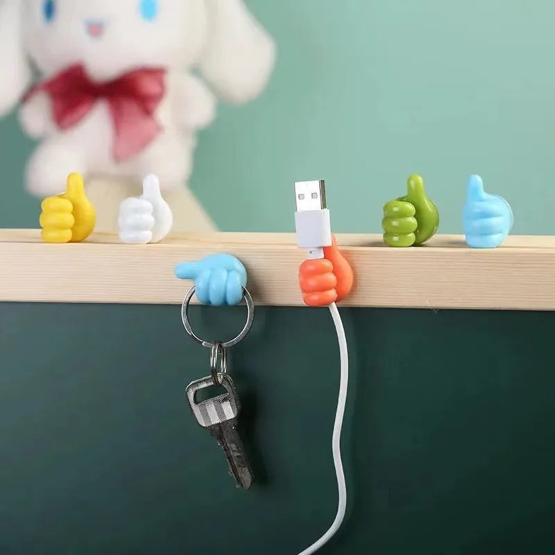 Hand-shaped Silicone Rubber Glasses Holder with Self-Adhesive Mini Hooks for Cord & Cable Organization  

Keep your space tidy with this innovative hand-shaped silicone rubber glasses holder! Perfect for organizing cables, charging lines, and glasses,