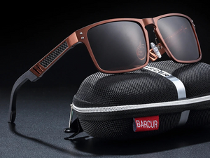 a pair of sunglasses sitting on top of a case