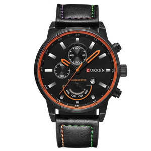 a black watch with orange and green accents