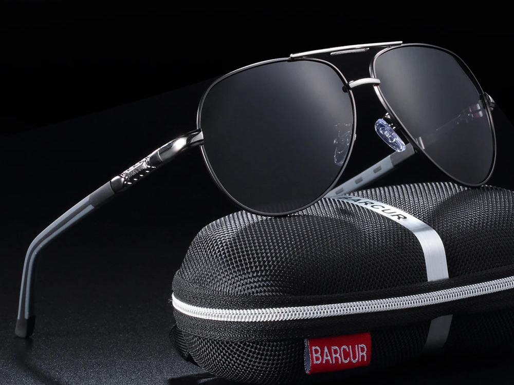 a pair of sunglasses sitting on top of a case